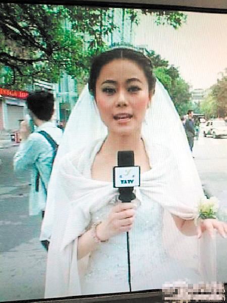 雅安女主播穿婚纱报告灾情 获赞"最美新娘"(图)