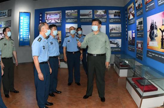 Xi inspects PLA aviation university ahead of Army Day
